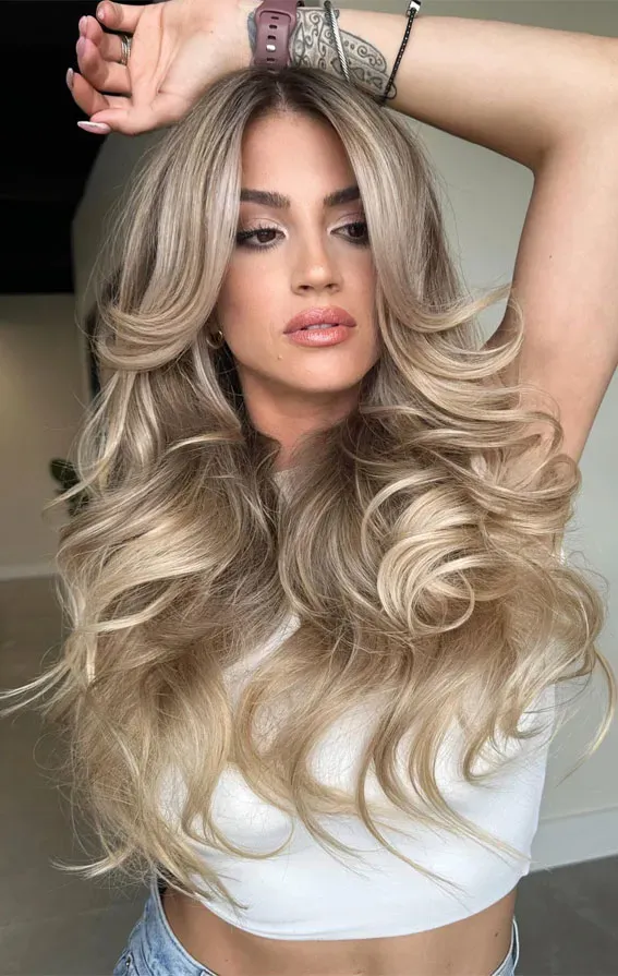 Butterfly cut blond hair: Achieve stunning volume now
