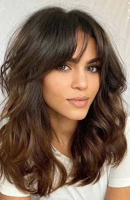 How to Style and Maintain Your Butterfly Cut Hair with Bangs