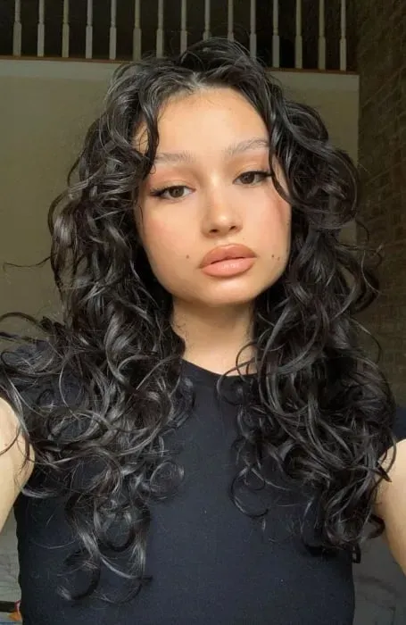 Keeping Your Butterfly Cut Long Wavy Hair Looking Fresh