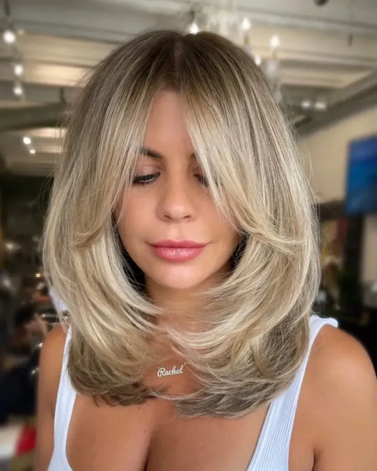 What Defines the Butterfly Cut on Shoulder Length Hair?