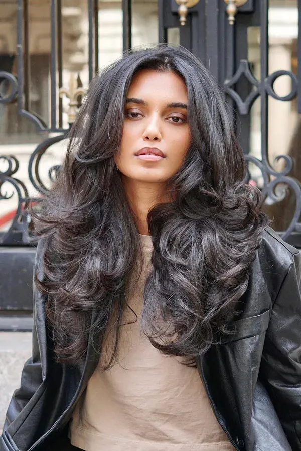 What Makes the Butterfly Cut Perfect for Long Wavy Hair?