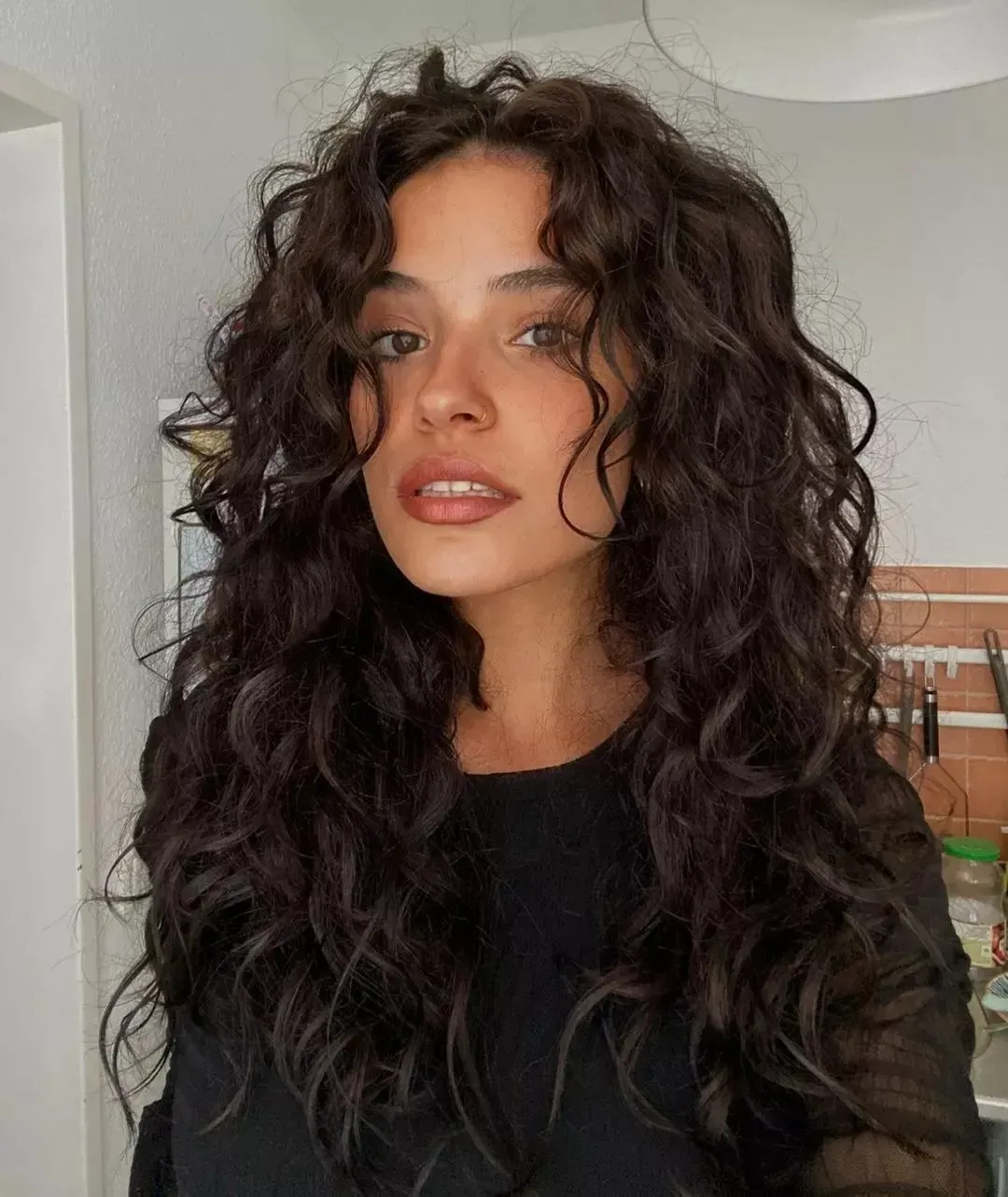 Why the Butterfly Cut Suits Long Curly Hair Textures